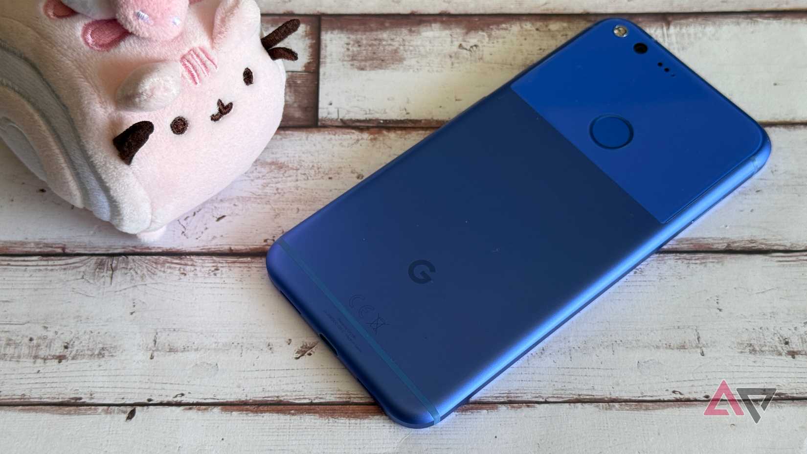 Google Pixel XL in Really Blue next to Pusheen
