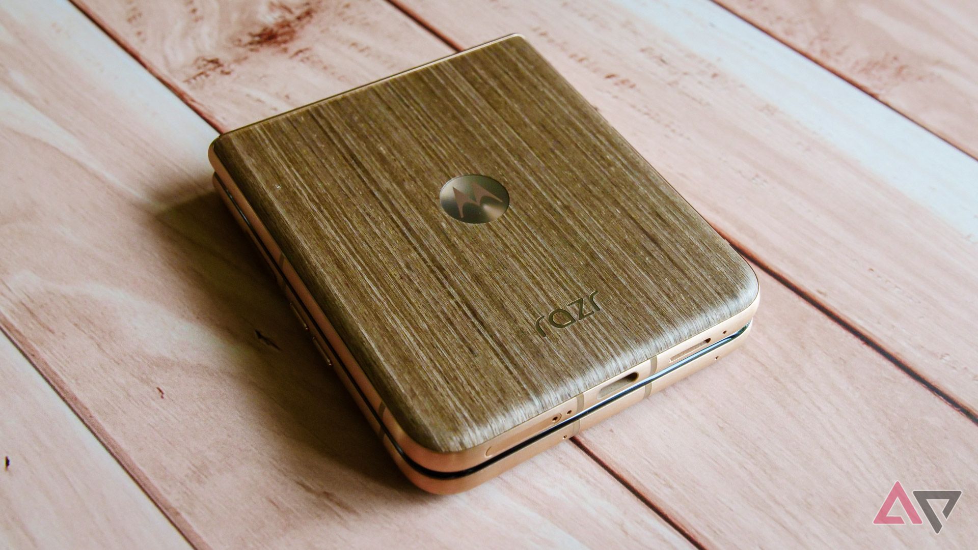 The Moto Razr Ultra's wood back, with the clamshell closed.