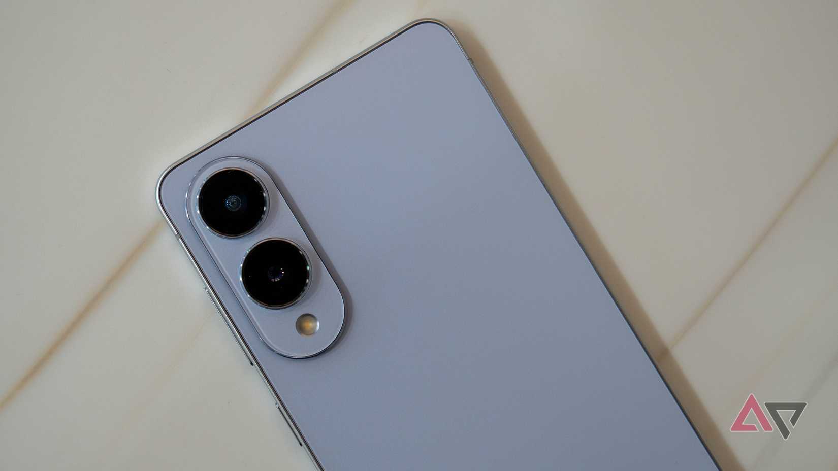 grey samsung galaxy edge phone on beige background