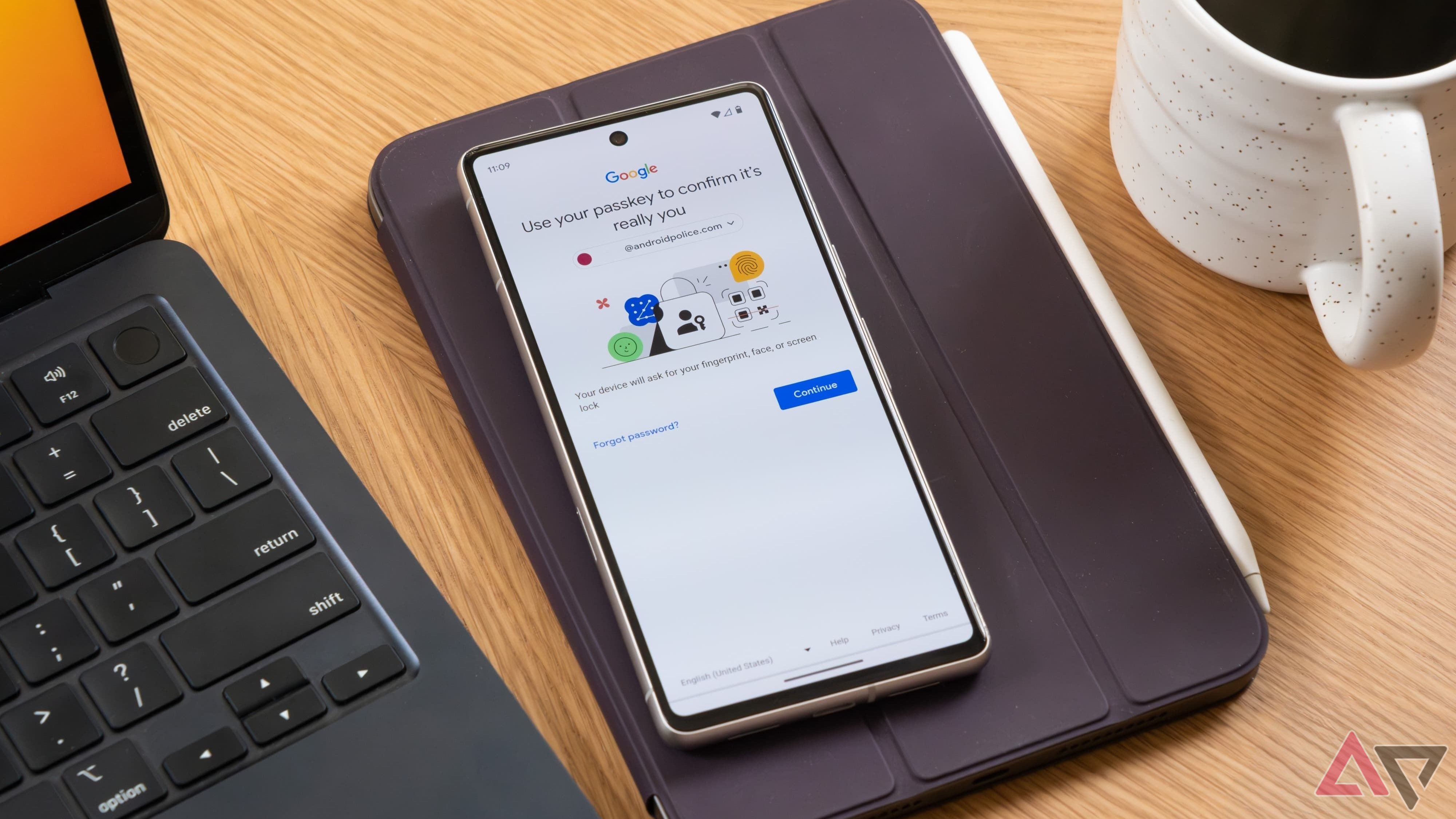 google accounts passkey screen on phone laying on top of tablet