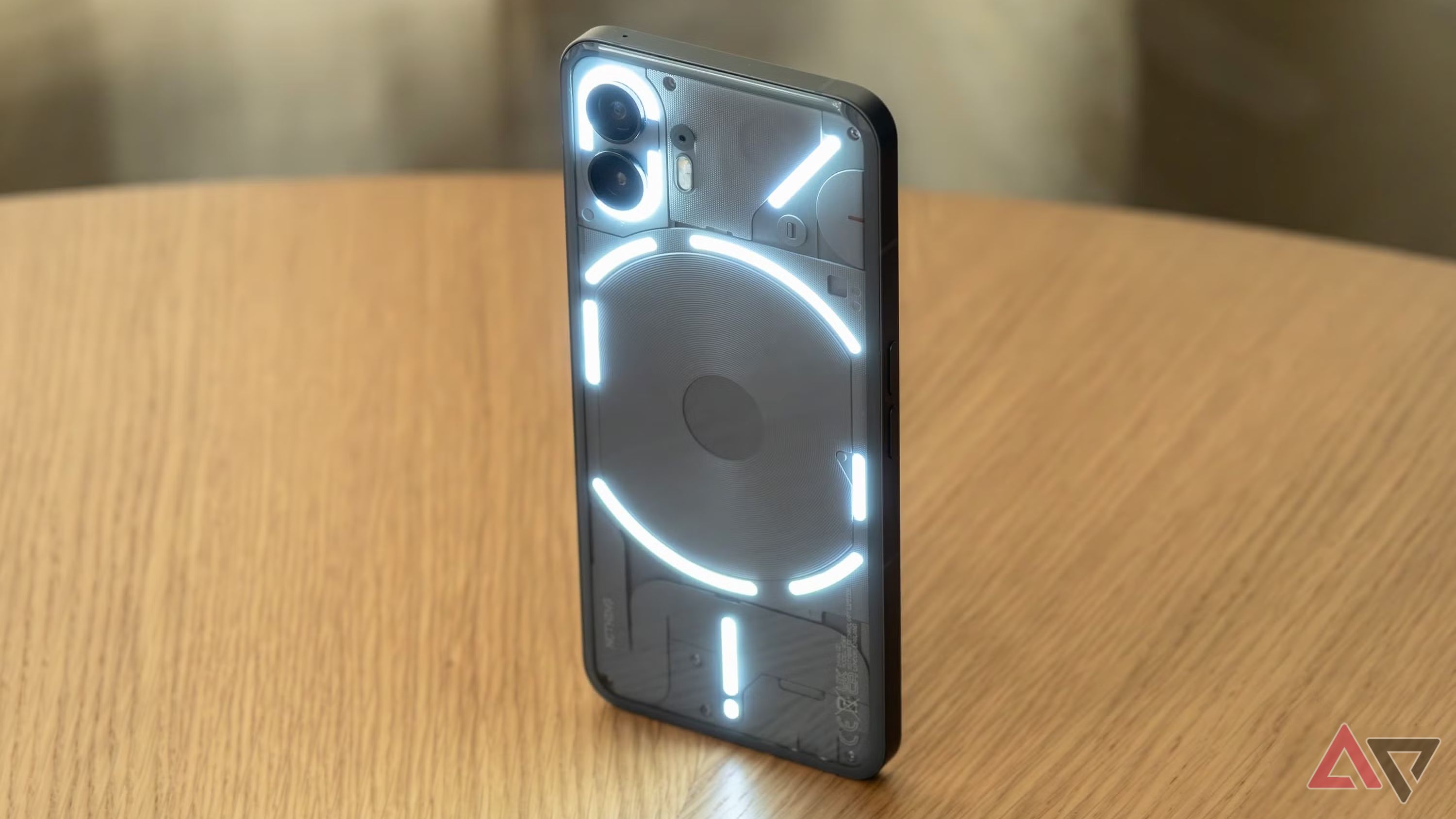 A picture of the Glyph Interface lit up on the back of the Nothing Phone 2.