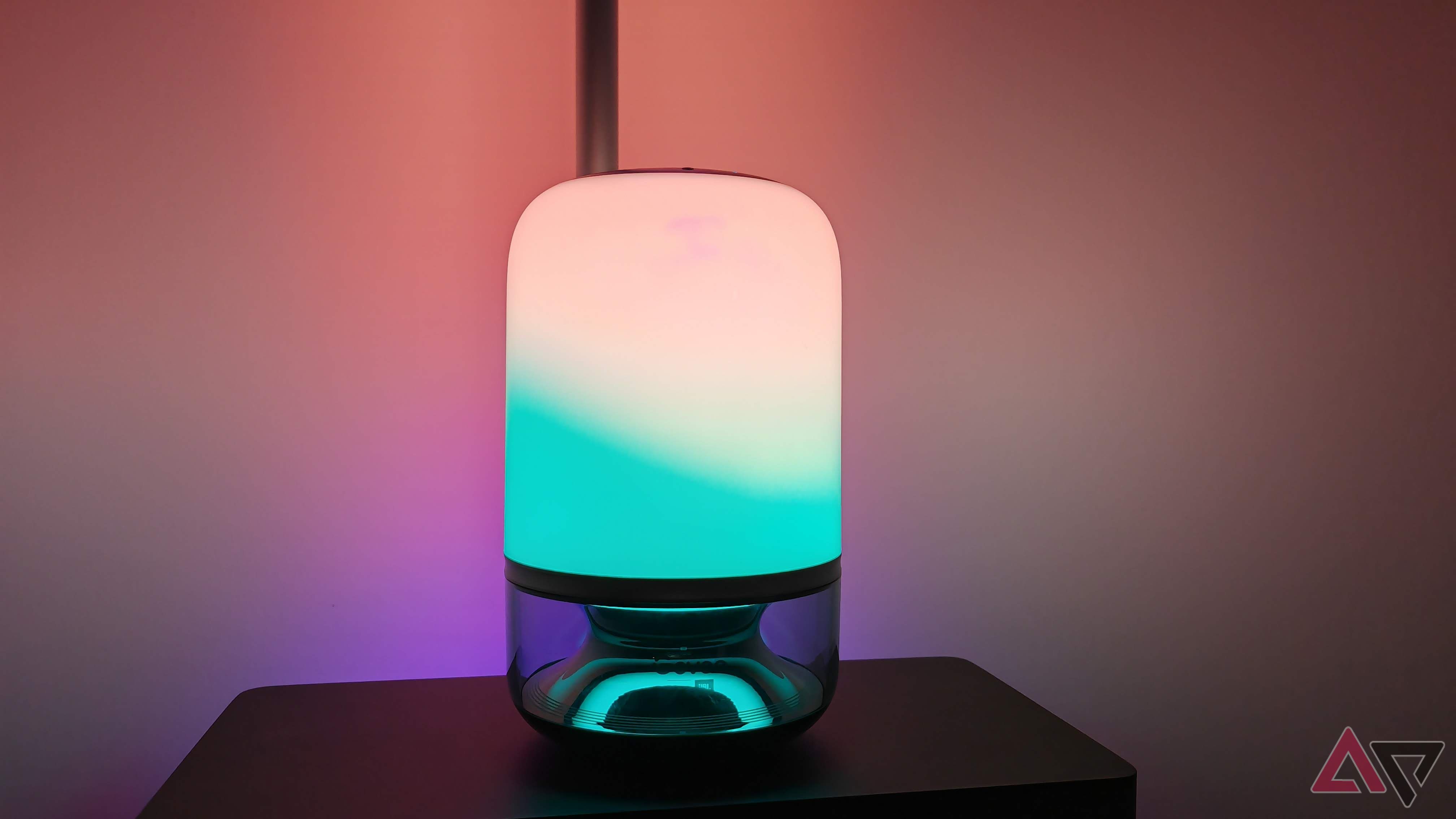 Govee Table Lamp 2 Pro x Sound by JBL showing a green and white light with a glowing light behind it.