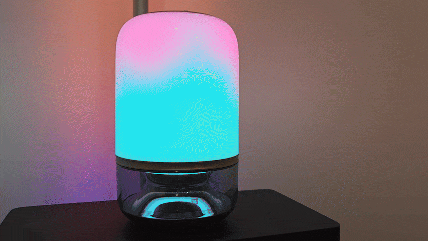 Govee Table Lamp 2 Pro x Sound by JBL showing changing color light with a glowing light behind it.