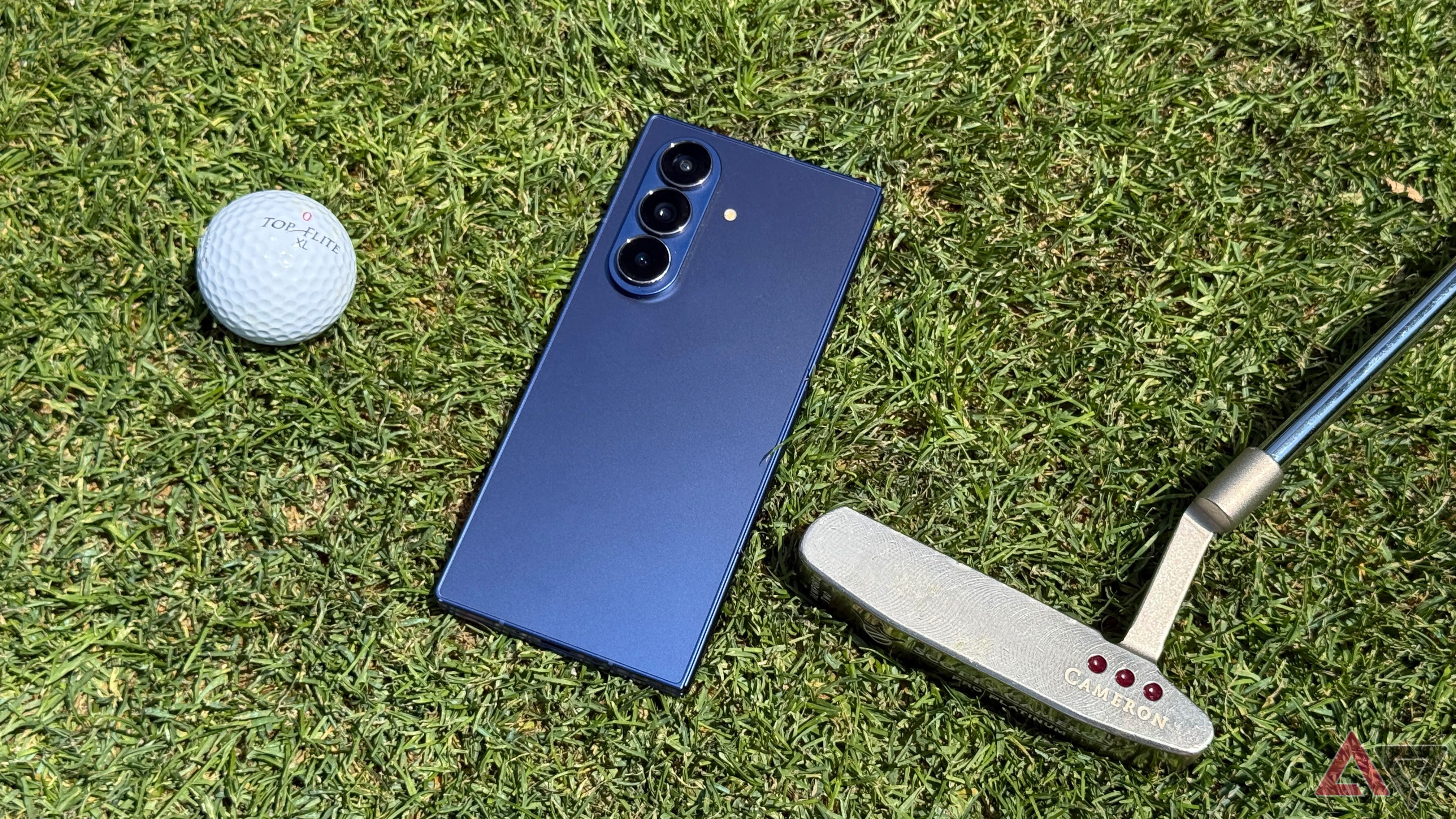 Samsung Galaxy Z Fold 7 next to a golf club and ball