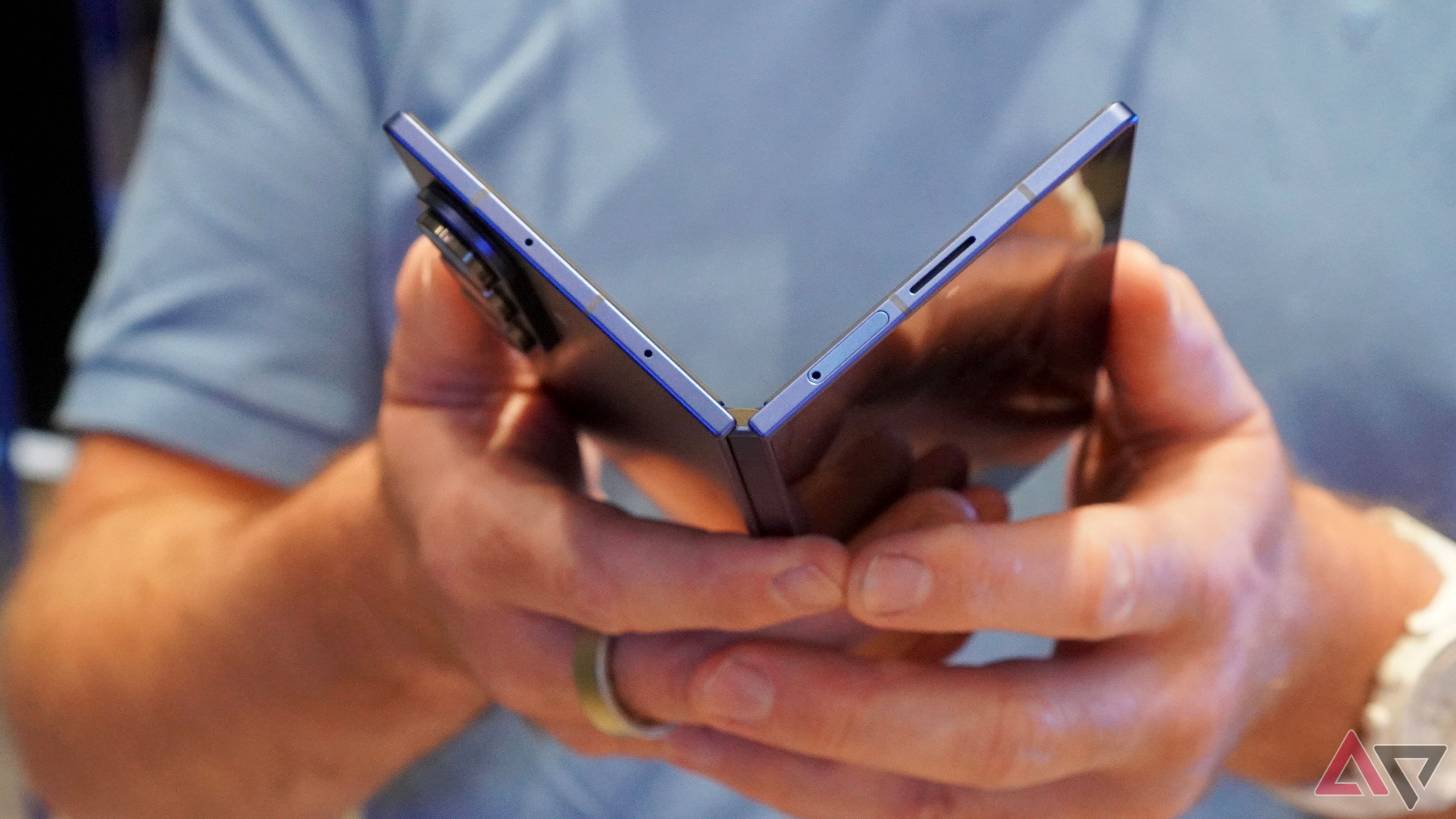 A person opening the Samsung Galaxy Z Fold 7