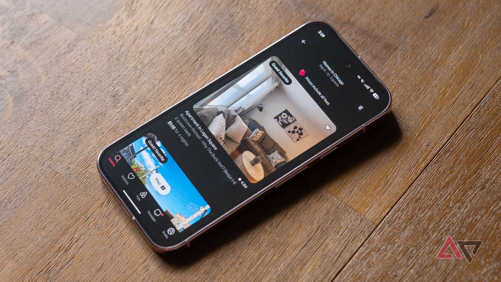 A Pixel 9 Pro showing the Airbnb app in expanded dark theme